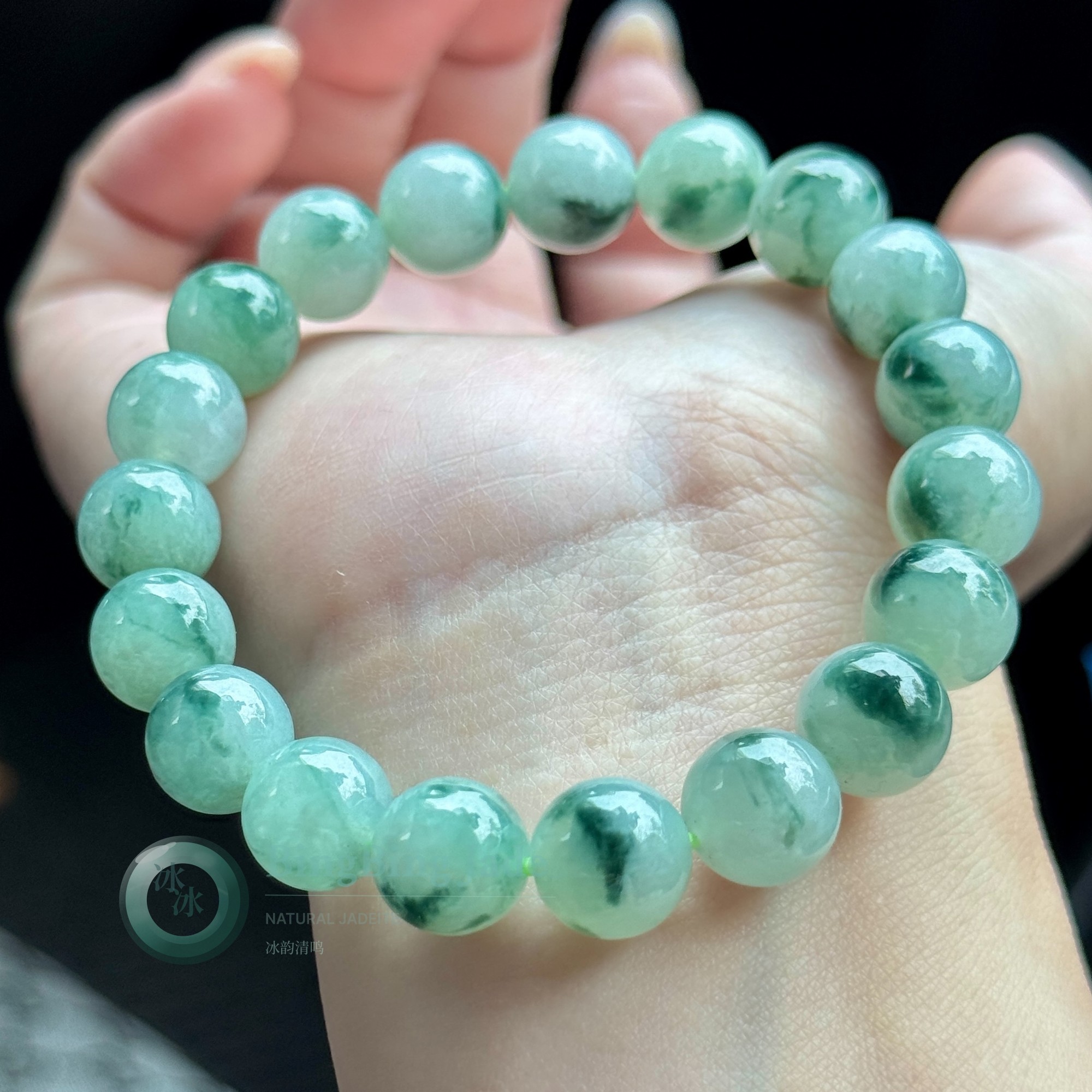 Floating Emerald Blossoms on Soft Green Jadeite Bracelet 10mm