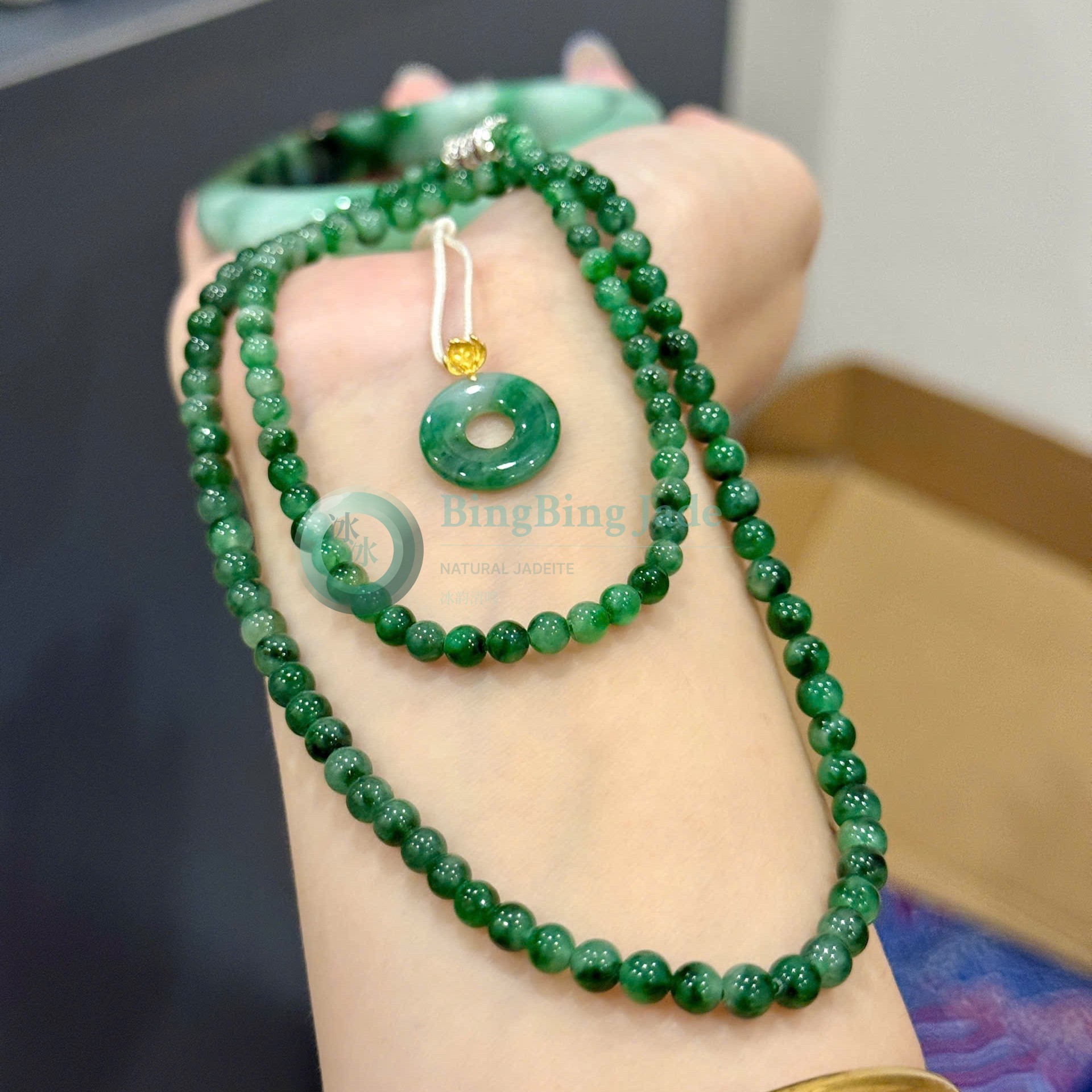 Deep Emerald Glutinous-to-Icy Jadeite Bead Necklace with Donut Pendant