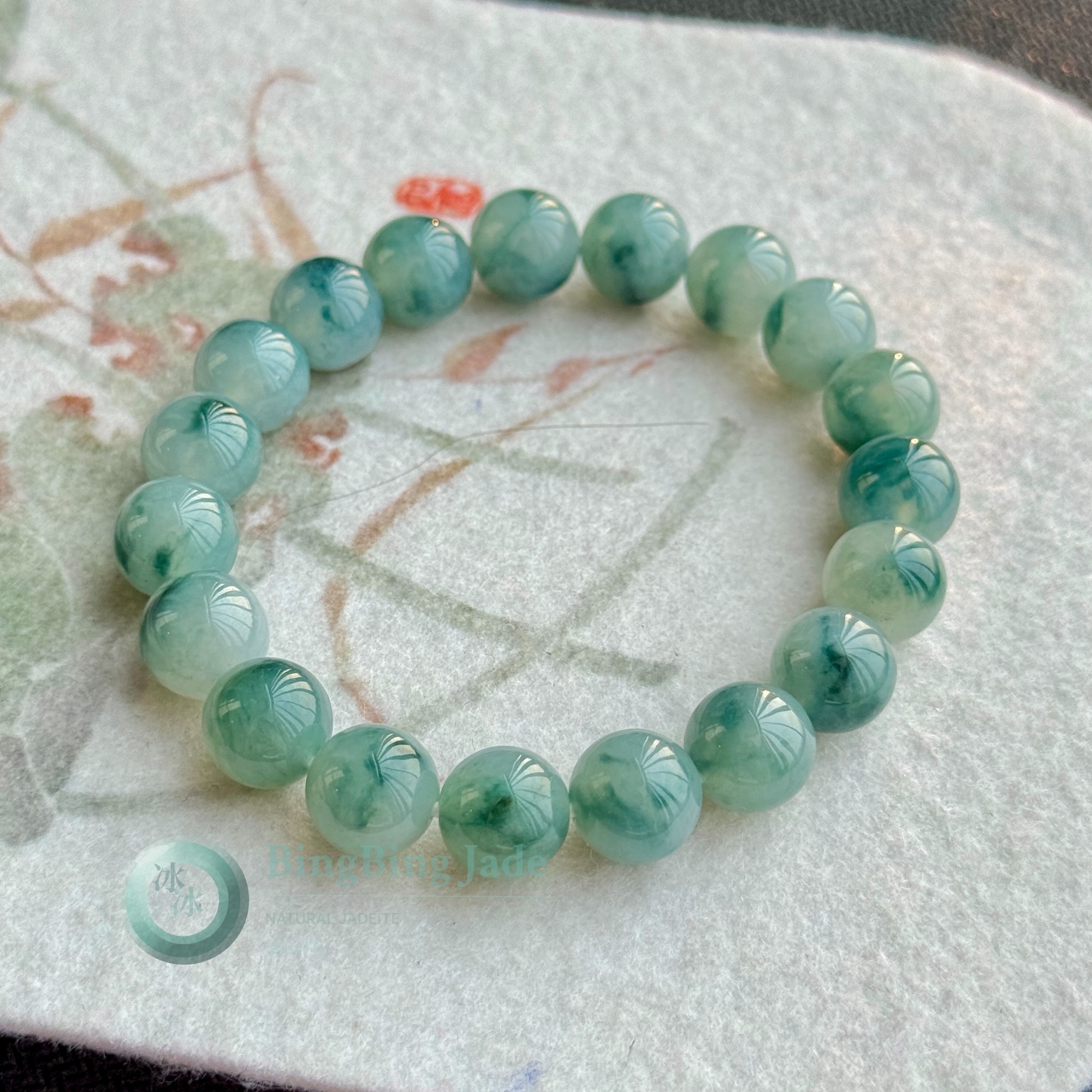 Lotus-Carved Misty Teal Jadeite Bead Bracelet 10.5mm