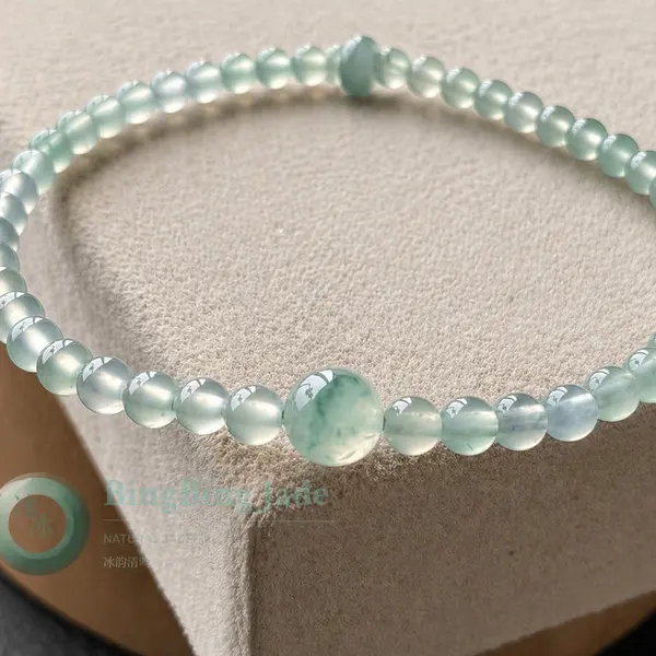 Icy Dewdrop Jadeite Bead Bracelet 3.8mm with Floating Green Accent