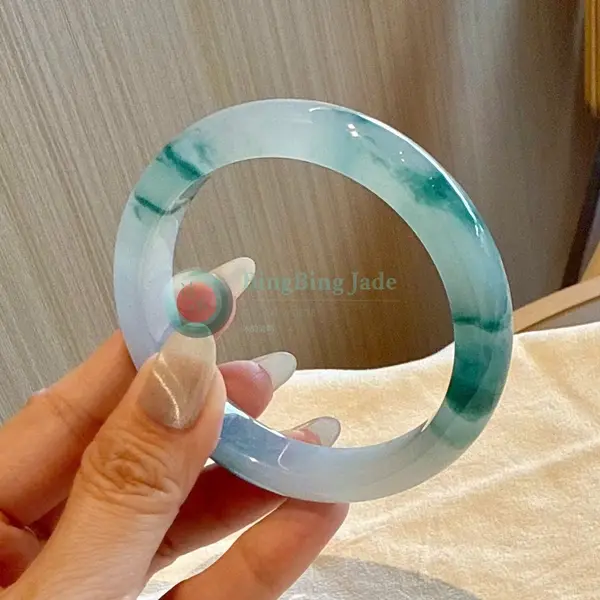 Icy Bangle with Floating Blue-Green Aquamarine Blooms 55.9mm