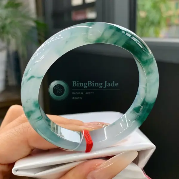 Icy Luminous Bangle with Floating Emerald Clouds — 53.6mm