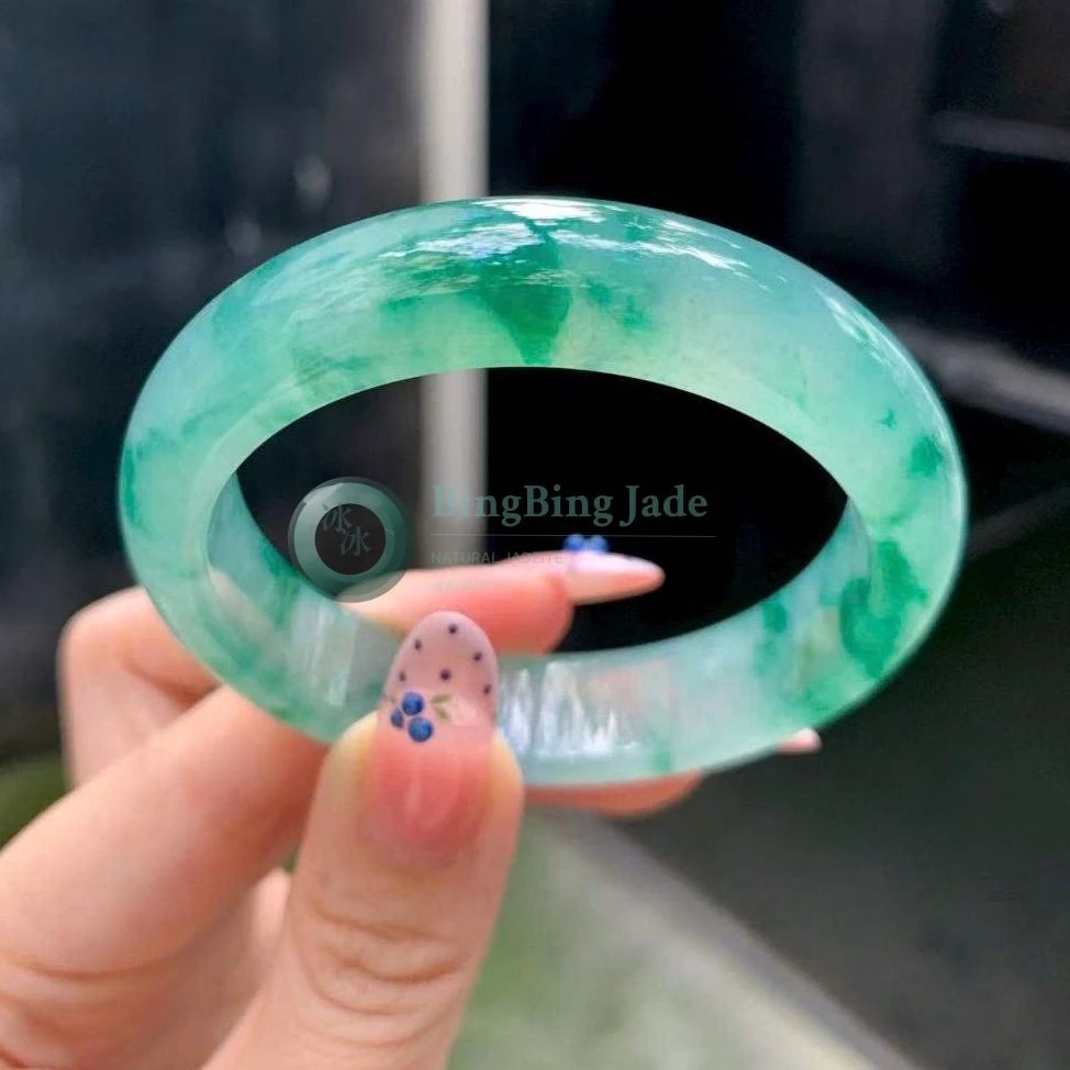 Icy Bloom Floating Emerald Jadeite Bangle 50mm