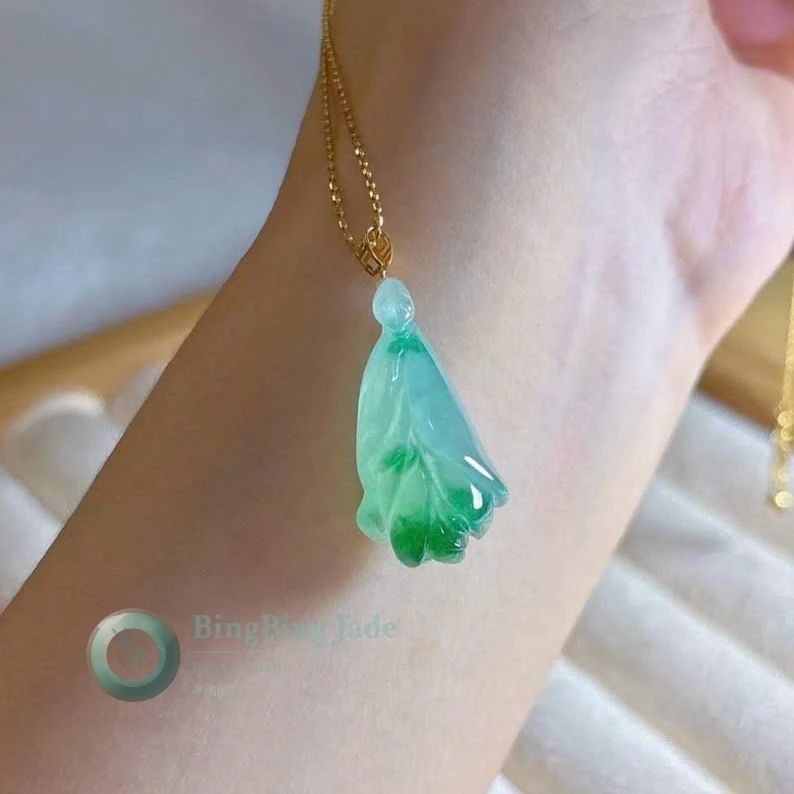 Icy Magnolia Bloom with Floating Emerald Veils — Jadeite Pendant