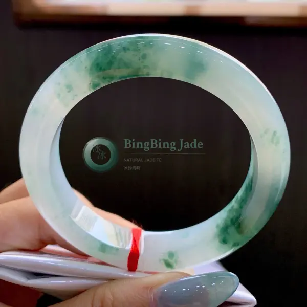 Icy White Bangle with Floating Emerald Blooms 53mm