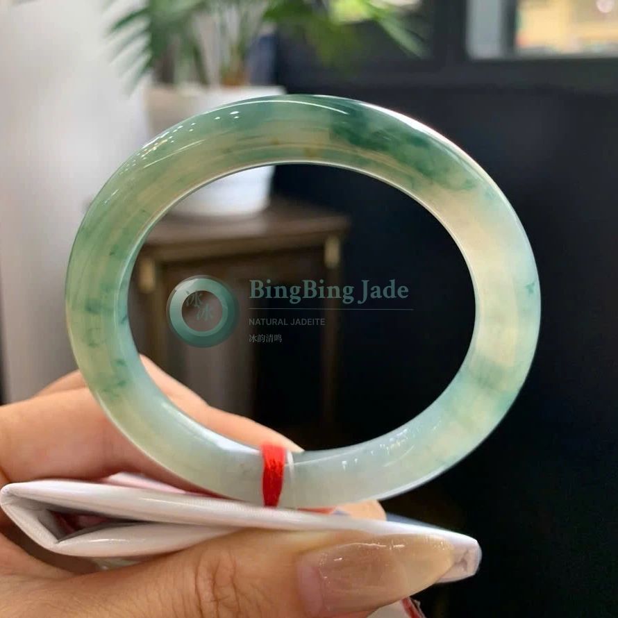 Icy Spring Waters with Floating Emerald Clouds — Round Bangle 52mm