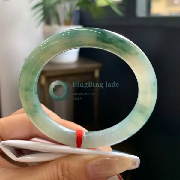 Icy Spring Waters with Floating Emerald Clouds — Round Bangle 52mm