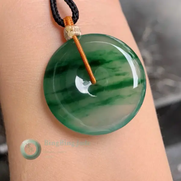 Luminous Emerald Donut Pendant — Floating Green Veils on Translucent Ground
