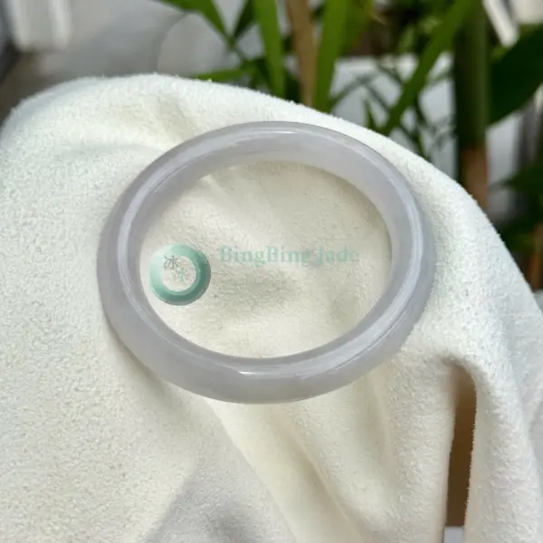 Icy Glutinous White Lavender-Kissed Jadeite Bangle 56mm