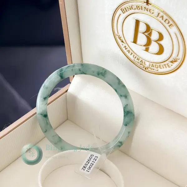 Scatter of Spring Blossoms — Jadeite Bangle 53mm