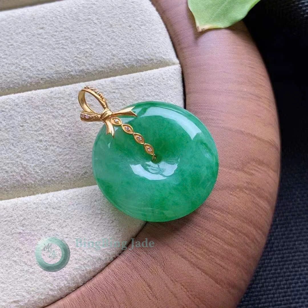 Vivid Spring Green Jadeite Donut Pendant with 18K Gold Bow Bail