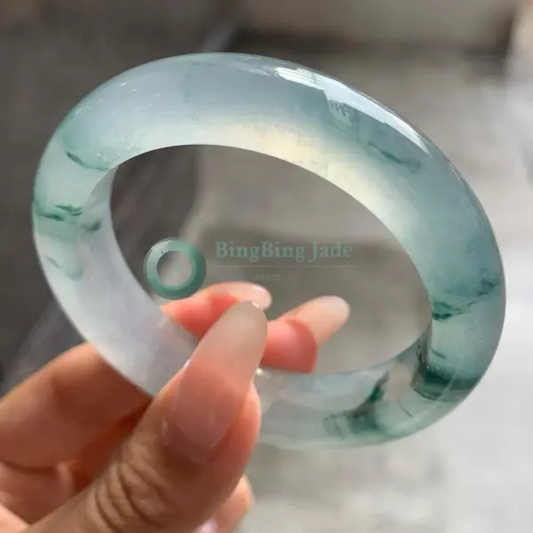 High Icy Aqua Jadeite Bangle with Floating Emerald Wisps