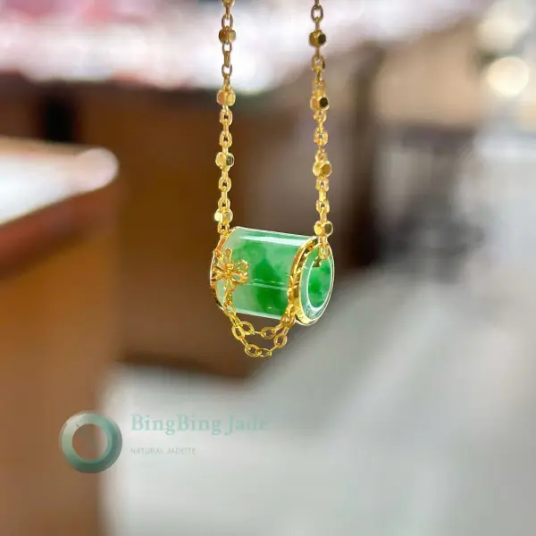 Floating Emerald Lu Tong Pendant — Translucent Green Cylinder on 18K Gold Chain