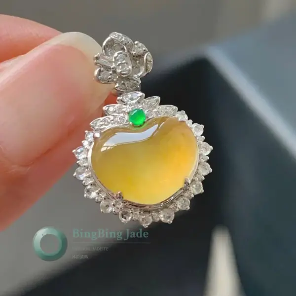 Icy Honey-Gold Gourd Jadeite Earring with Floating Emerald Accent