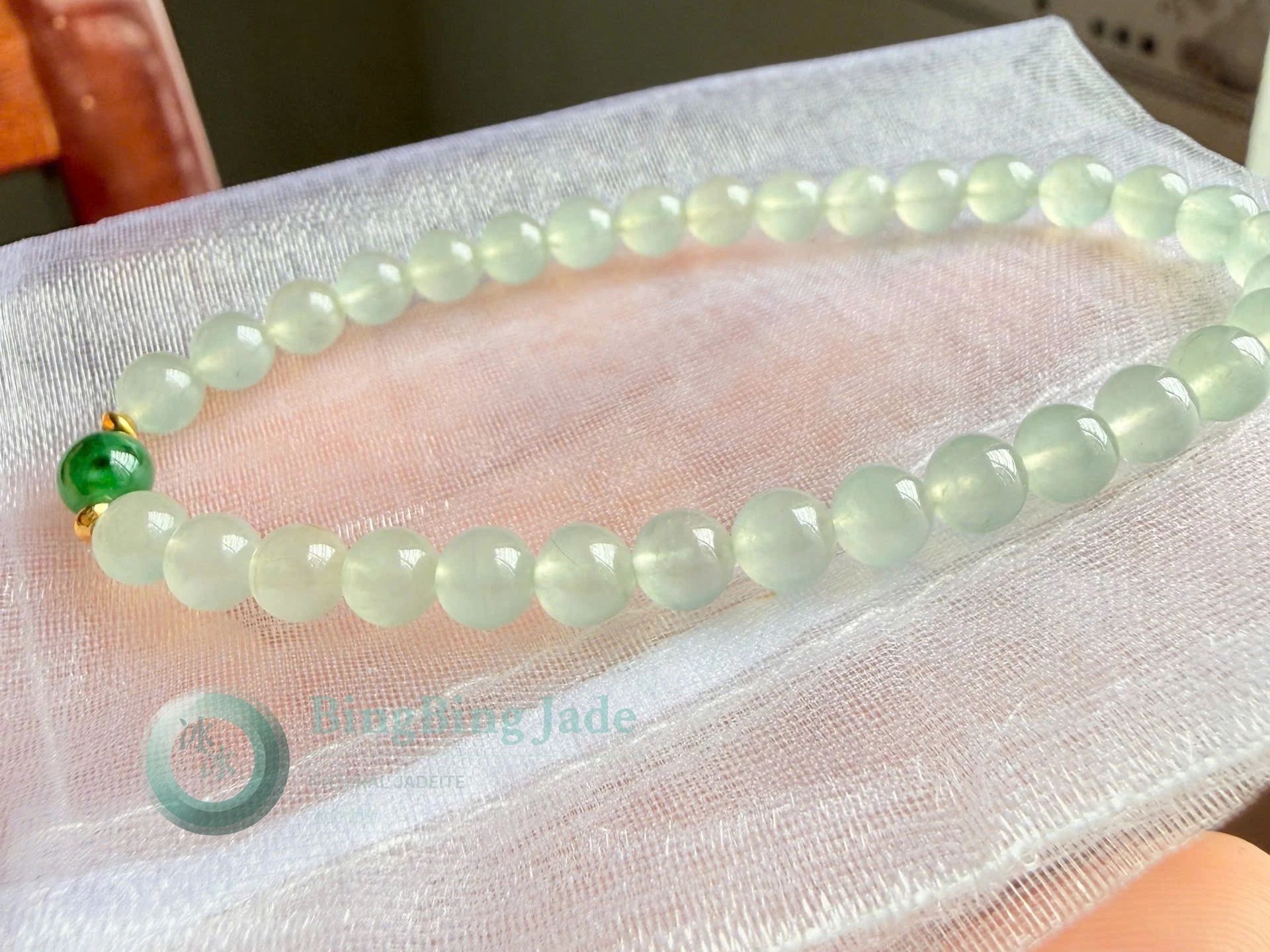 High Icy Dewdrop Jadeite Bead Bracelet with Floating Emerald Accent