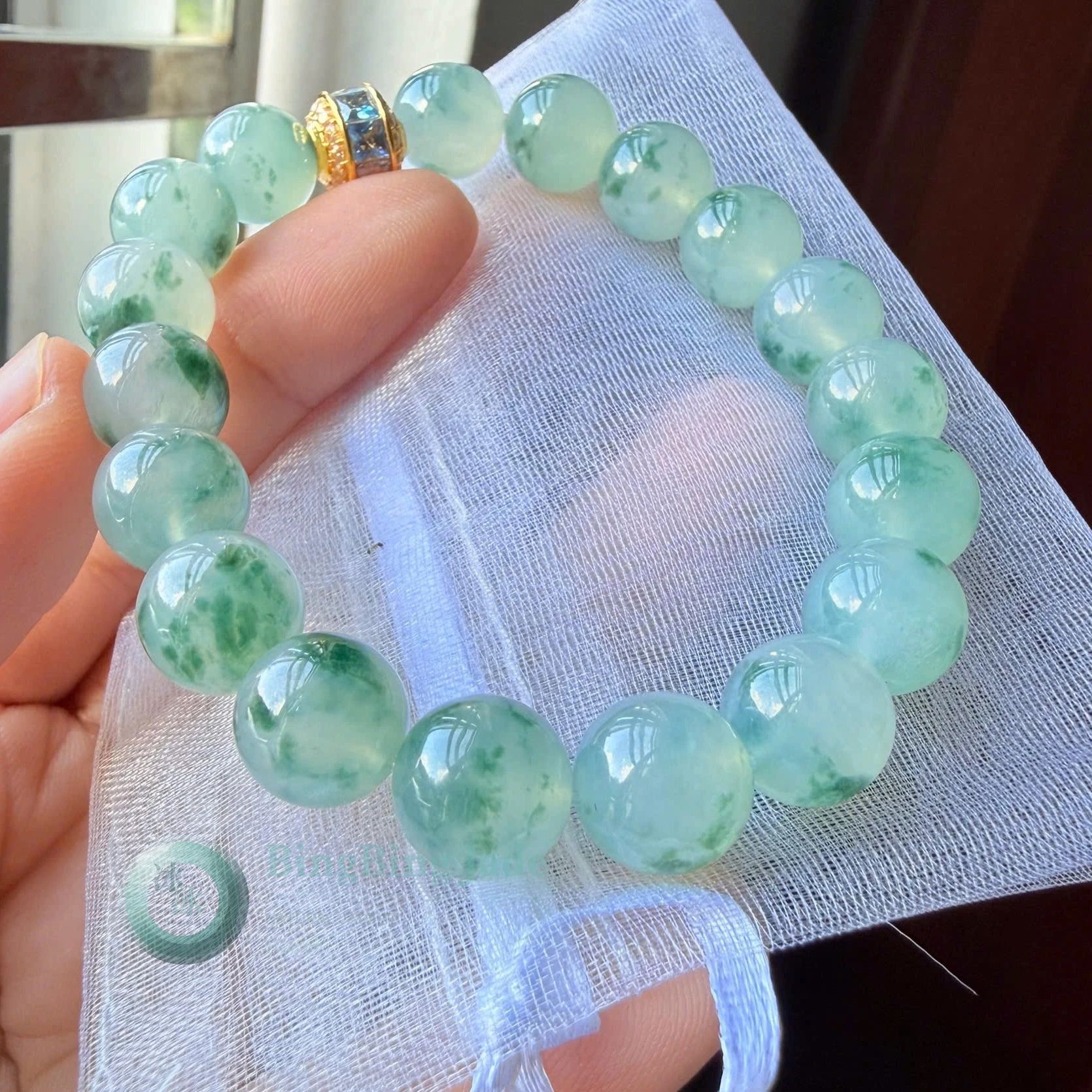 Icy Floating Blossom Jadeite Bracelet 10mm — Soft Green Marbling with 18K Gold Charm