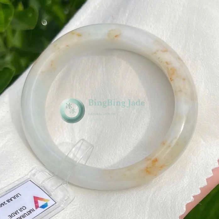 Osmanthus Bloom Oval Bangle 56mm — Warm Honey Kissed Translucent White