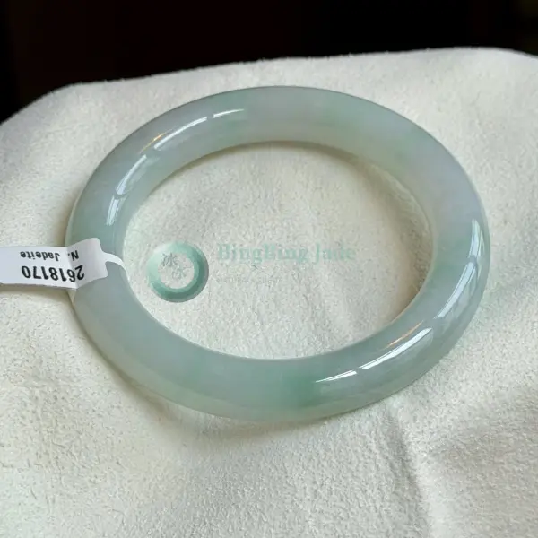 Soft Jade Glow with Floating Green Blush — Round Bar Bangle 58mm