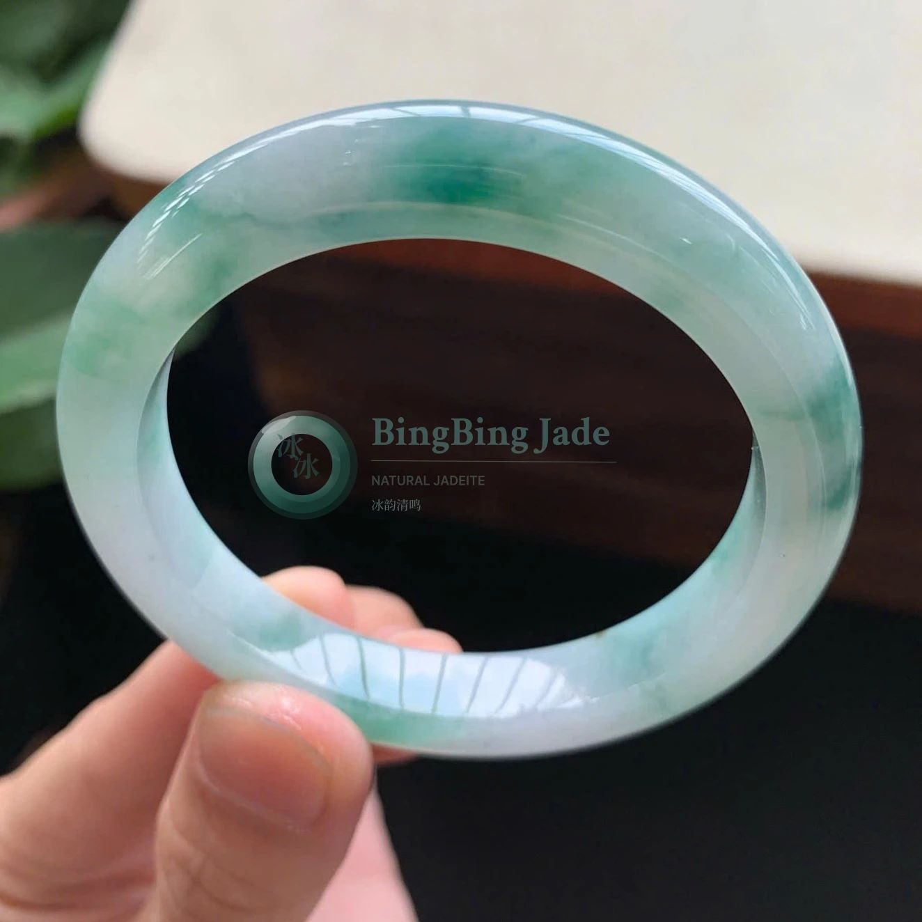 Icy Glutinous Floating Green Jadeite Bangle 50mm