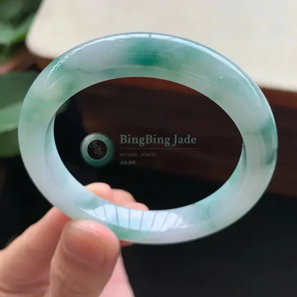 Icy Glutinous Floating Green Jadeite Bangle 50mm