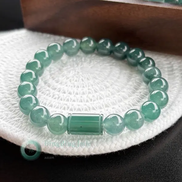 Icy Teal-Green Jadeite Bead Bracelet with Barrel Charm